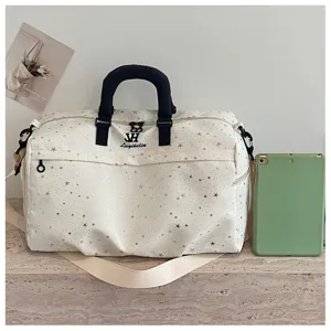 Large capacity sports duffel bag with star print, travel shoulder bag for gym and fitness.