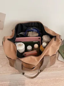 Large capacity travel duffel bag with multi-pocket design, perfect for gym and weekend trips.