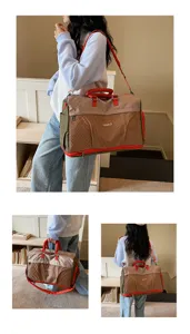 Large capacity travel duffel bag with shoulder strap and color block design for weekend trips.