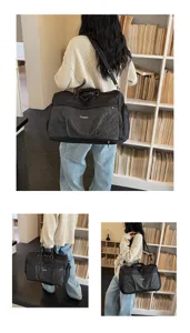 Large capacity travel duffel bag with black nylon and plaid pocket design, ideal for gym and weekend trips.
