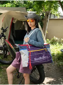 Outdoor travel crossbody bag with elastic bungee cords, large capacity fitness and sports tote.