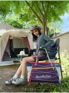Close-up of the outdoor travel bag featuring durable fabric and elastic drawstrings.