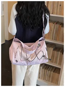 Large capacity light purple canvas travel duffel bag for sports, gym, and outdoor use.