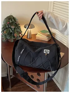 Large capacity travel duffel bag, stylish fitness gym bag with shoulder strap for outdoor sports.
