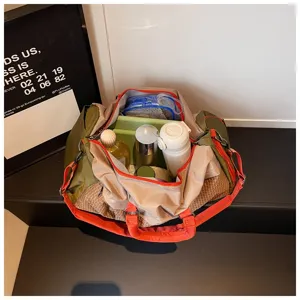 Detailed view of the large travel duffel bag showing spacious interior and compartments.