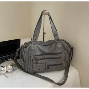 Vintage multi-zipper slouchy PU leather shoulder handbag detail view, large capacity casual tote.