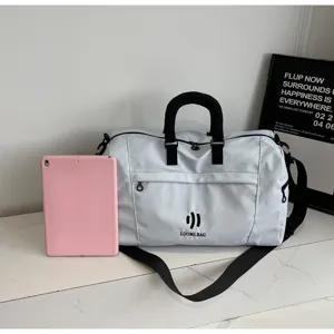 Large capacity travel duffel bag in light grey with shoulder strap for gym and business trip.