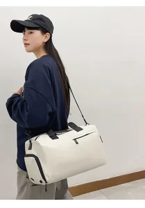Large capacity waterproof travel duffel bag for sports, gym, and outdoor daily use.