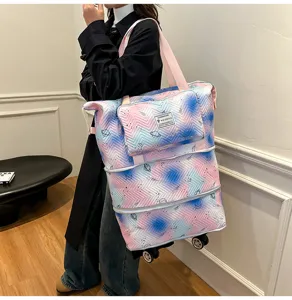 Gradient print rolling travel tote bag with universal wheels and expandable design for women.