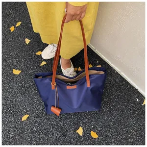 Casual τσάντα shopper μεγάλης χωρητικότητας για γυναίκες με καφέ δερμάτινες λαβές.