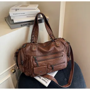 Vintage brown leather motorcycle shoulder bag with multi-zipper pockets for women daily use.