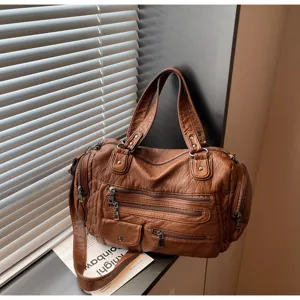 Vintage distressed multi-zipper motorcycle shoulder bag, retro PU leather crossbody tote.