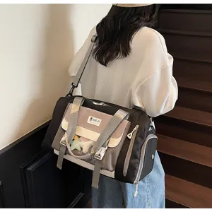 Korean style color-blocking travel duffel bag with clear window and large capacity.