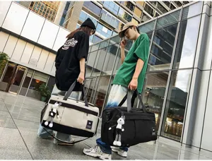 Large capacity travel duffel bag, multi-functional shoulder bag for weekend trips and sports gear.