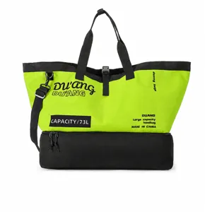 Grand sac de voyage de sport avec compartiment à chaussures, en vert et noir.