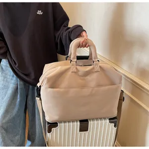 Sac de voyage pliable minimaliste, grand sac à main fourre-tout pour voyage et affaires.