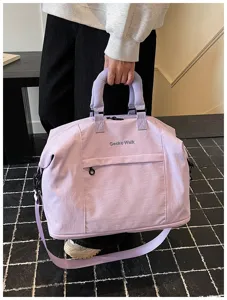 Lightweight purple travel duffel bag with shoulder strap, perfect for gym, fitness and commuting.