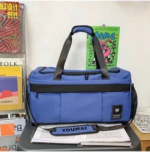 Blue travel duffel bag multi-functional luggage shoulder bag for short trips and business.