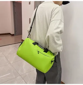 Large capacity waterproof sports duffel bag for gym travel and outdoor fitness activities.