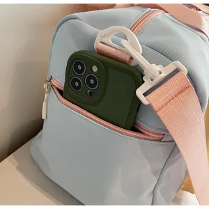 Close-up detail view of the stylish travel duffel bag front pocket with contrast straps.