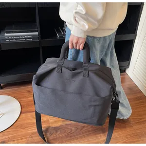Large capacity travel duffel bag with shoulder strap, minimalist daily casual luggage.