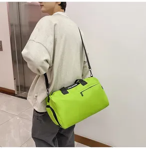 Large capacity waterproof sports gym duffel bag with shoulder strap for travel and outdoor use.