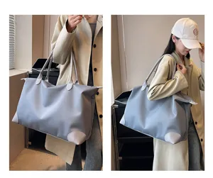 Large capacity lightweight travel duffel bag, casual luggage handbag for short business trips.