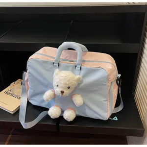 Sac de voyage rose et bleu avec adorable ours en peluche, grande capacité pour sport ou travail.