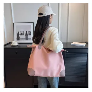 Large capacity pink nylon travel shoulder bag for short trips, gym and weekend getaways.