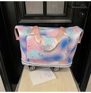 Travel rolling tote bag with universal wheels, gradient star print large capacity storage.