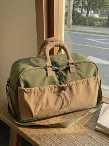 Große grüne Reisetasche für Damen, Weekender Handgepäck Tasche aus Segeltuch mit Schultergurt.