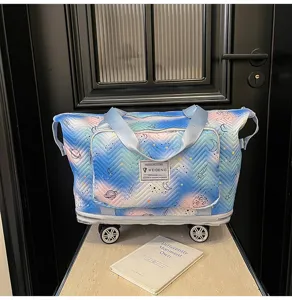 Expandable travel tote bag with universal wheels, large capacity starry sky printed design.