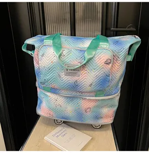 Large capacity expandable travel tote bag with universal wheels, pastel gradient space print.