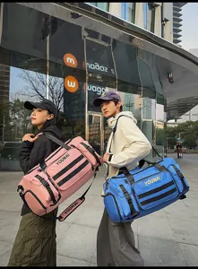 Fashionable multi-pocket travel duffel bag with shoulder strap, ideal for commute and trips.