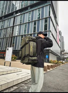 Outdoor travel backpack detail showing multi-pocket design and durable straps in urban scene.