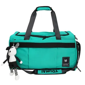 Large capacity cyan travel duffel bag with black straps and cute plush pendant for short trips.