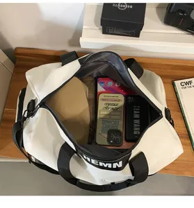Large capacity waterproof sports gym duffel travel bag for outdoor travel and daily fitness use.