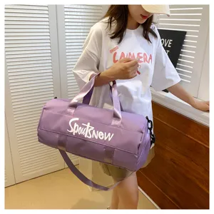 Purple large capacity sports duffel bag for gym, travel, and fitness clothing storage needs.