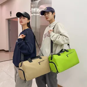 Large capacity waterproof travel duffel bag sports gym bag with shoulder strap for outdoor fitness.