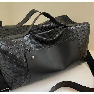 Borsa da viaggio in pelle intrecciata nera grande capacità borsa sportiva con manico.
