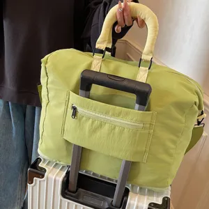 Solid color travel duffel bag with luggage sleeve lightweight gym handbag for women