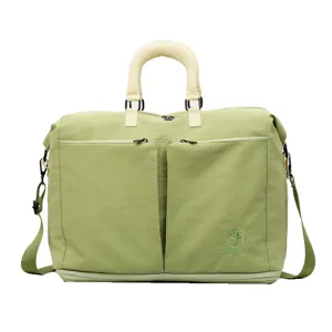 Stylish solid color travel duffel bag with shoulder strap, large capacity gym weekend bag.