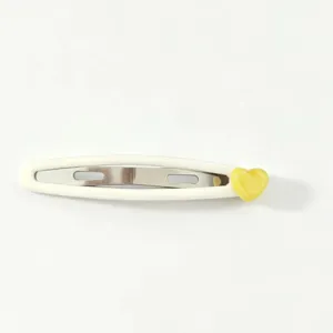 Korean style cute white hair clip with a yellow heart design for cute daily hairstyles.