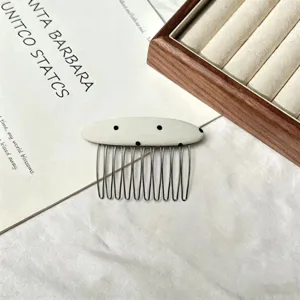 Fabric polka dot hair comb, elegant hair styling accessory for bangs and broken hair.