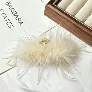 Fluffy ostrich feather hair claw clip, elegant white hairpin for women daily hair styling.