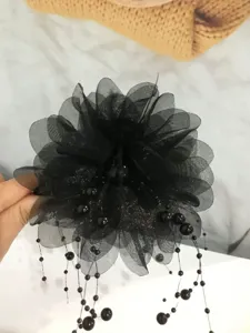 Elegant black mesh flower hair claw clip featuring delicate sparkling beaded tassels design.