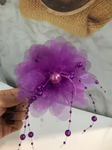 Purple organza flower hair clip with beaded tassels and feather for elegant daily hairstyles.