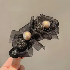 Zwarte strik haarhaakje voor vrouwen, grote parel haakjes klem voor stijlvolle haarstyling.