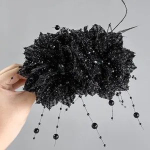Black lace flower hair clip with beaded tassels and feather accents for elegant daily hairstyles.