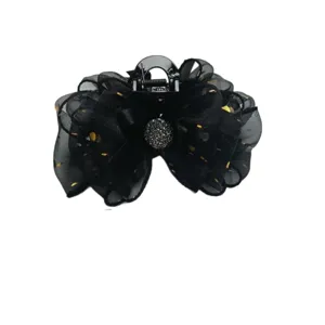 Black mesh hair claw clip with golden dots and sparkling center ball for elegant hairstyles.